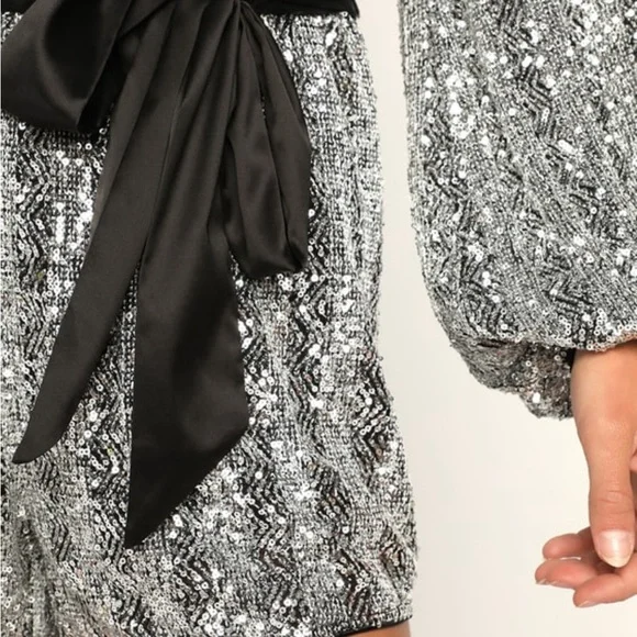 Sequin long sleeve romper. Blousy bodice. Ballon sleeves with elastic cuffs. - Picture 4 of 4